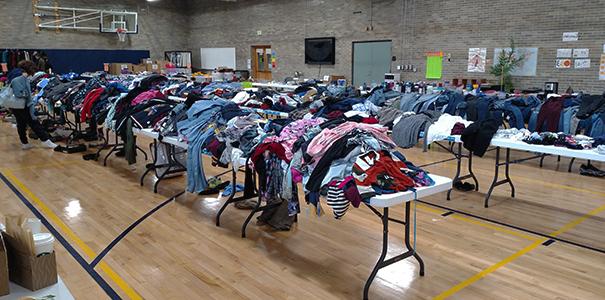 Clothes on tables at past CSC Yard Sale
